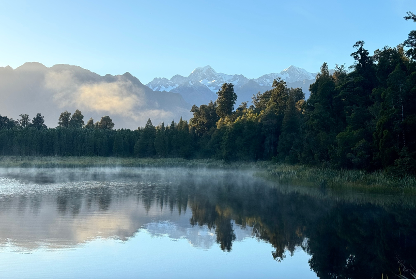 Best walks in New Zealand - Lake Matheson view of Mountains reflecting on a lake