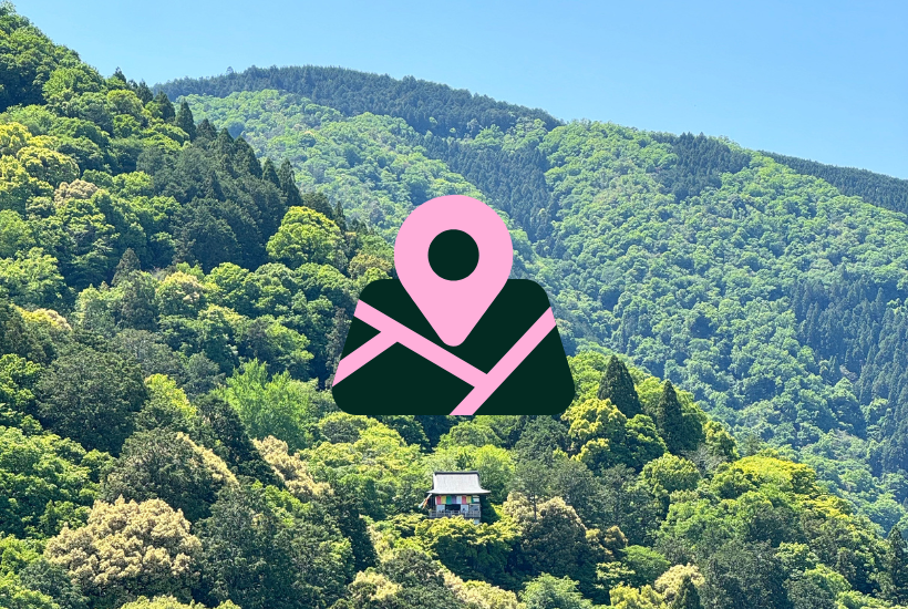 Google maps pin on top of a view of Kyoto Japan