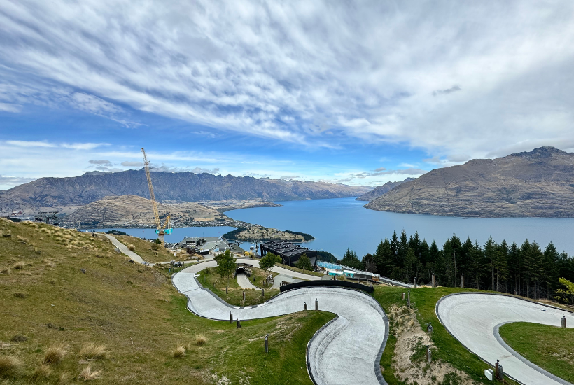 Luge Queenstown, track looping down the mountain with views of lakes and mountains