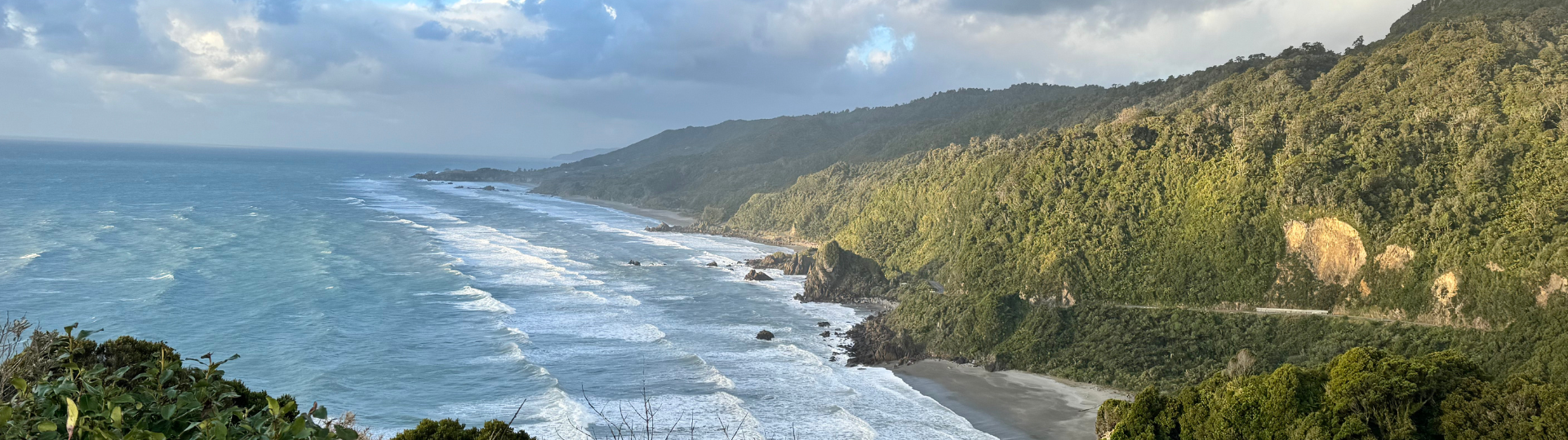 West Coast New Zealand viewpoint looking over sea and cliffs