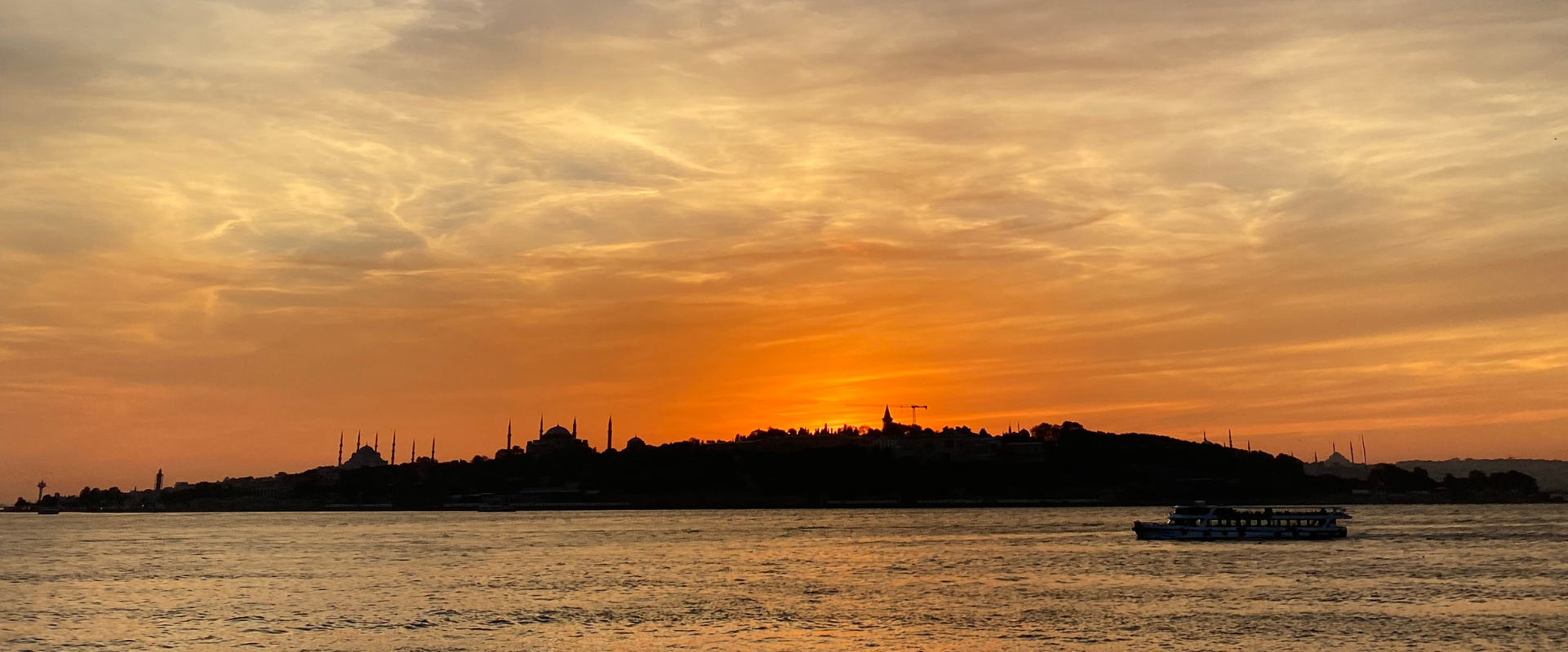 Long weekend in Istanbul, city at sunset on the water